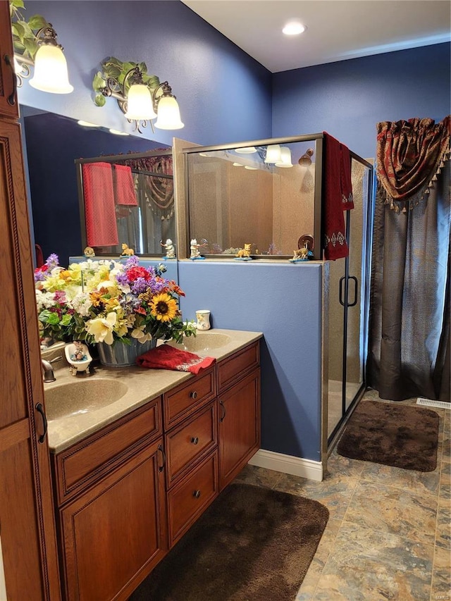 10359 Bounds Rd, Shipman, IL 62685 - full bathroom with a stall shower and double vanity