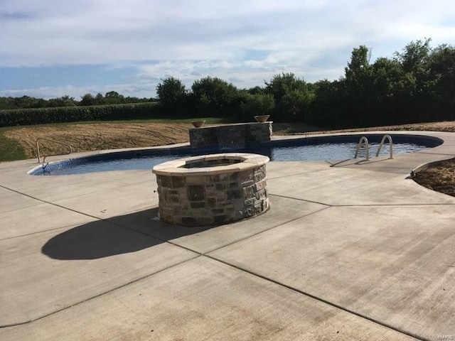 10359 Bounds Rd, Shipman, IL 62685 - swimming pool featuring an outdoor fire pit and a patio