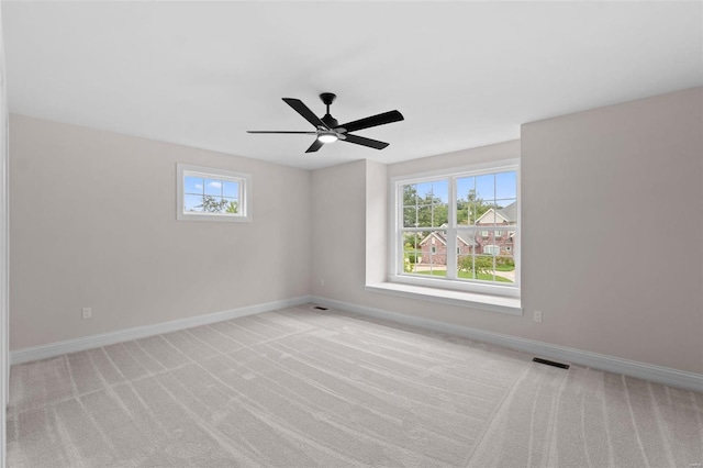 1315 Breezeridge Dr, Saint Louis, MO 63131 - unfurnished room featuring light colored carpet, baseboards, and a ceiling fan