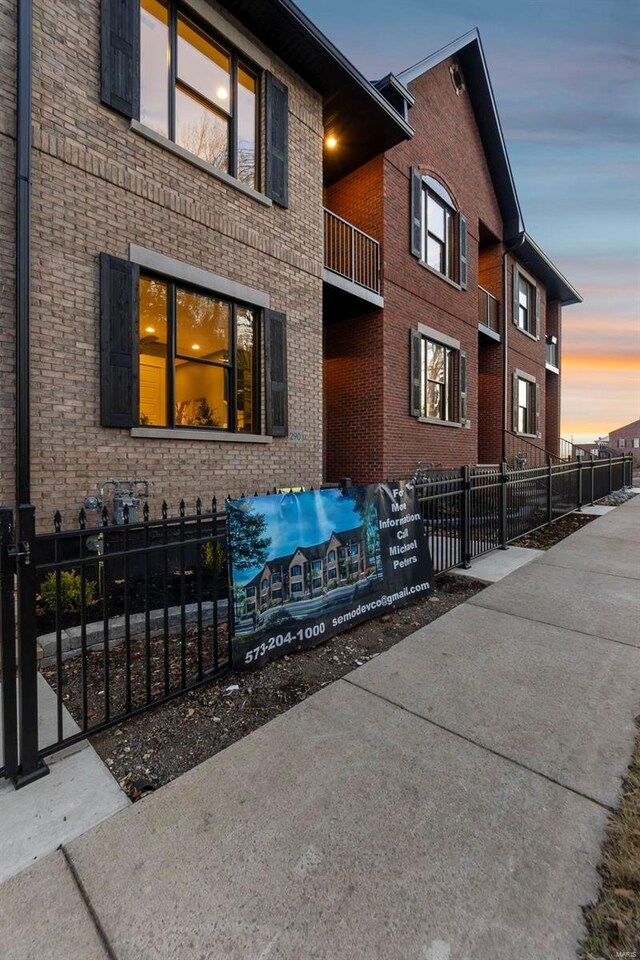 292 N Main St, Cape Girardeau, MO 63701 - property exterior at dusk featuring brick siding