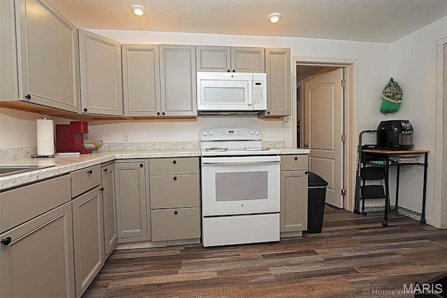 1439 N Spanish St, Cape Girardeau, MO 63701 - kitchen featuring white appliances, gray cabinetry, dark wood-style floors, recessed lighting, and light countertops