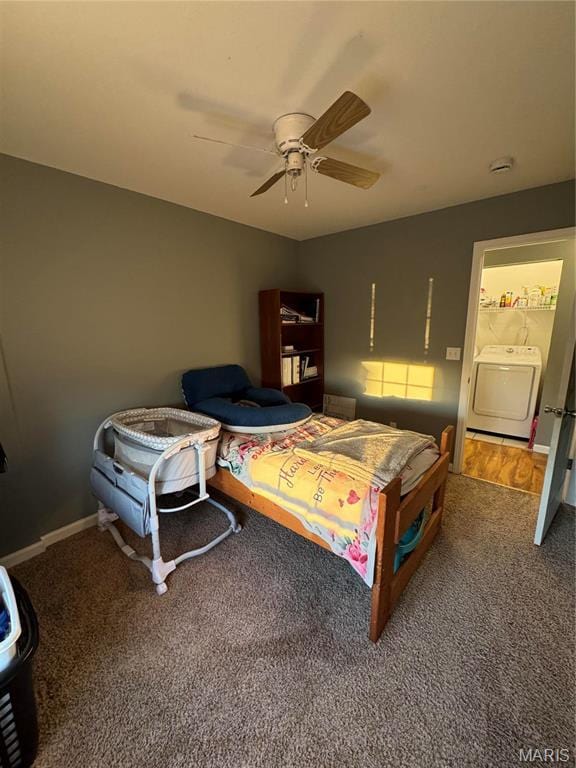 carpeted bedroom with washer / dryer, ceiling fan, and baseboards
