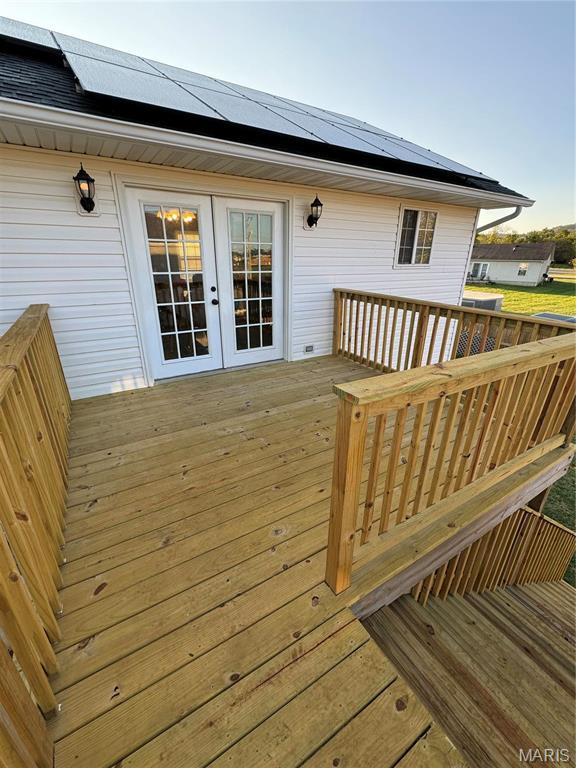 wooden terrace with french doors