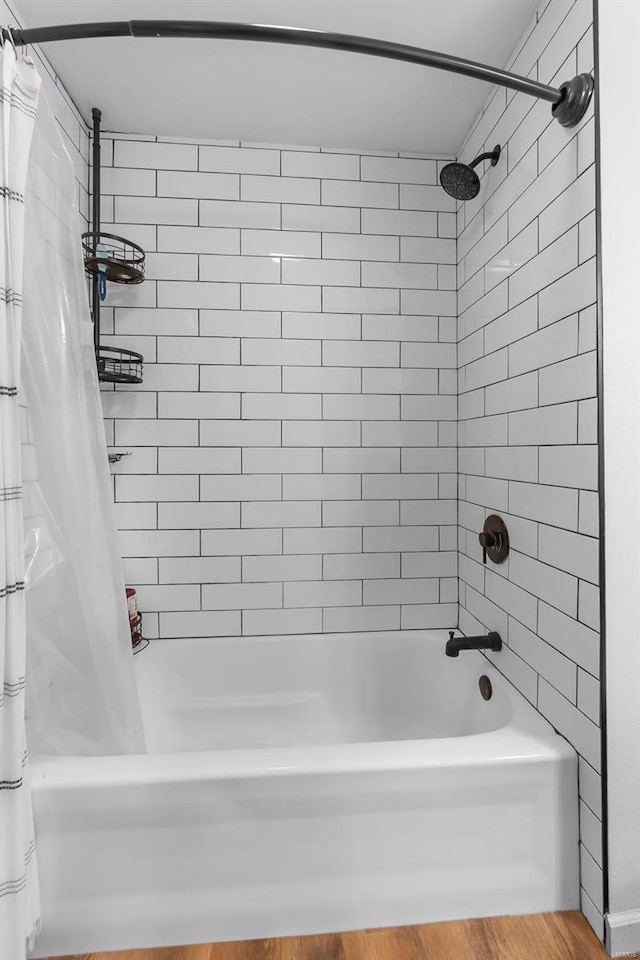 bathroom with shower / bath combination with curtain