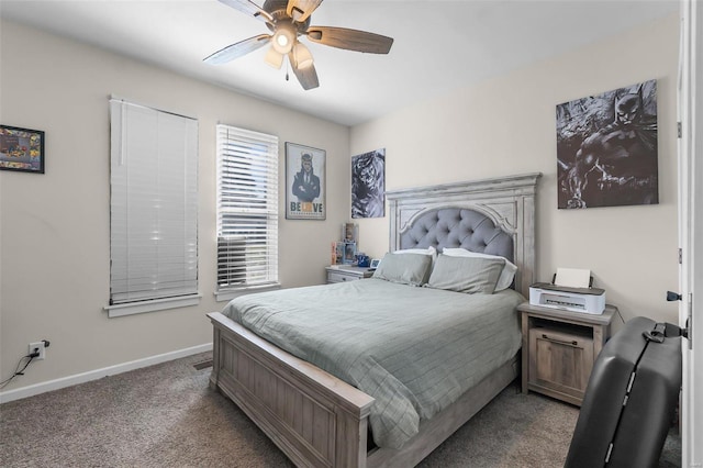 carpeted bedroom featuring a ceiling fan and baseboards