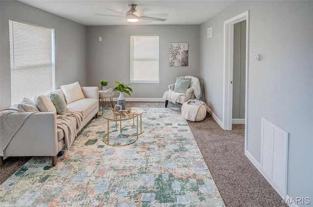 8546 US Highway 50, Lebanon, IL 62254 - carpeted living area featuring ceiling fan and baseboards