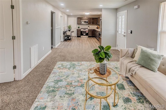 8546 US Highway 50, Lebanon, IL 62254 - living room with light colored carpet and recessed lighting