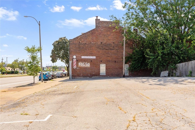 1809 S 7th St, Saint Louis, MO 63104 - view of building exterior featuring fence