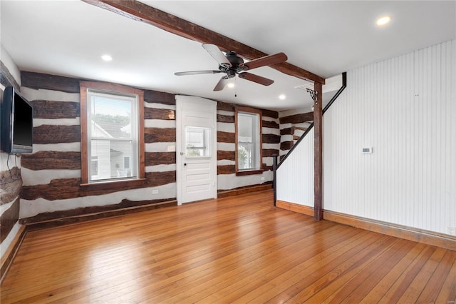 1137 Main St, Maeystown, IL 62256 - unfurnished living room with light wood finished floors, ceiling fan, baseboards, wooden walls, and recessed lighting