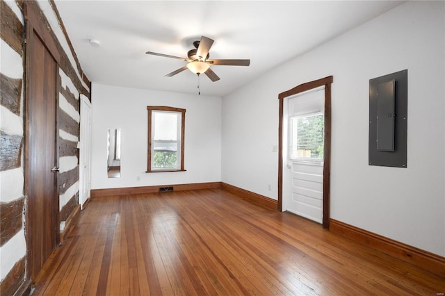 1137 Main St, Maeystown, IL 62256 - spare room featuring electric panel, hardwood / wood-style flooring, baseboards, a ceiling fan, and a smoke detector