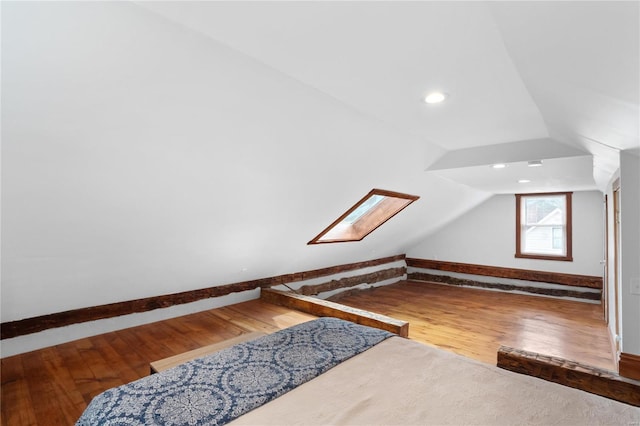 1137 Main St, Maeystown, IL 62256 - additional living space featuring wood finished floors, vaulted ceiling, and a skylight