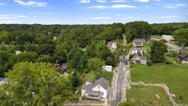 1137 Main St, Maeystown, IL 62256 - aerial perspective of suburban area with a heavily wooded area