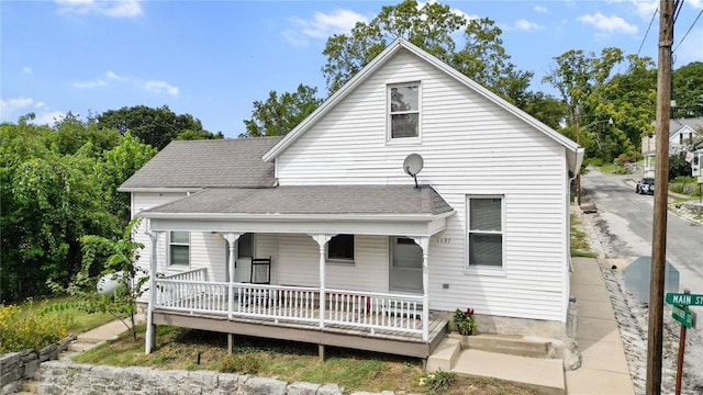 1137 Main St, Maeystown, IL 62256 - back of house with a shingled roof and covered porch