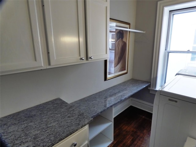 14 N Kingshighway Blvd Unit 7 4Bs, Saint Louis, MO 63108 - laundry room featuring washer / dryer, dark wood-style floors, a desk, and cabinet space