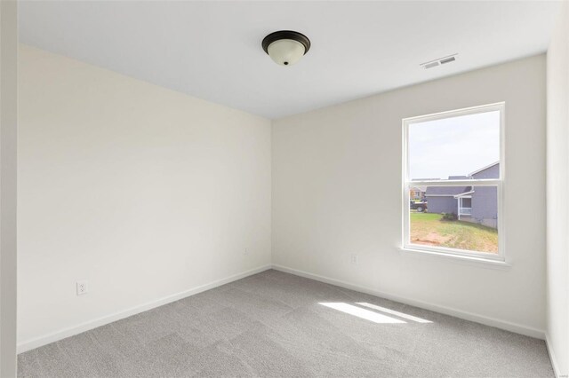 102 Harrow Dr, Ofallon, MO 63385 - empty room featuring carpet floors and baseboards