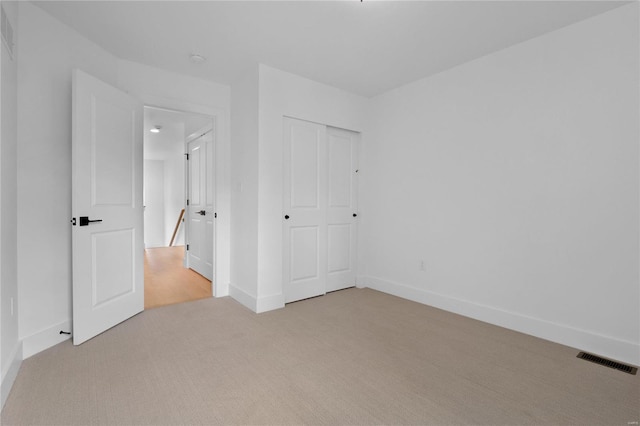2017 Woodsey Dr, Brentwood, MO 63144 - unfurnished bedroom with carpet flooring, baseboards, and a closet