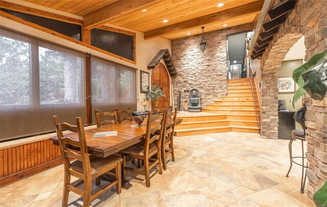 10010 Edmondson Hills Dr, Rolla, MO 65401 - dining room featuring wooden ceiling, recessed lighting, light stone finish floors, beamed ceiling, and stairs