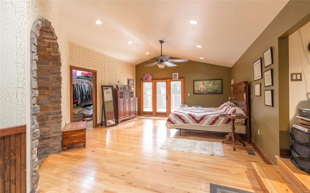 10010 Edmondson Hills Dr, Rolla, MO 65401 - bedroom featuring light wood-type flooring, vaulted ceiling, a spacious closet, access to outside, and french doors