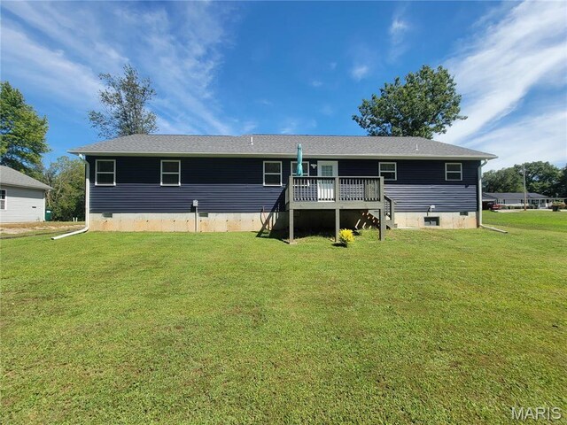 301 S Sloan St, Lebanon, MO 65536 - rear view of house featuring a lawn, a deck, and crawl space