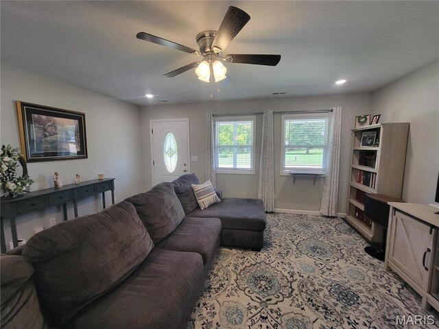 301 S Sloan St, Lebanon, MO 65536 - living room with ceiling fan, baseboards, light carpet, and recessed lighting