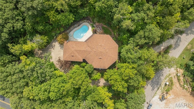 drone / aerial view of a pool