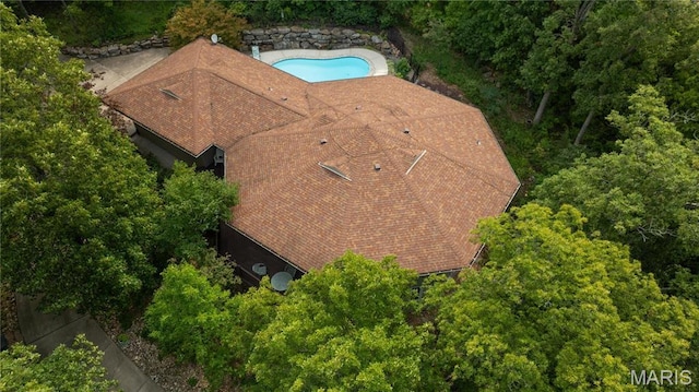 view from above of property with a pool area