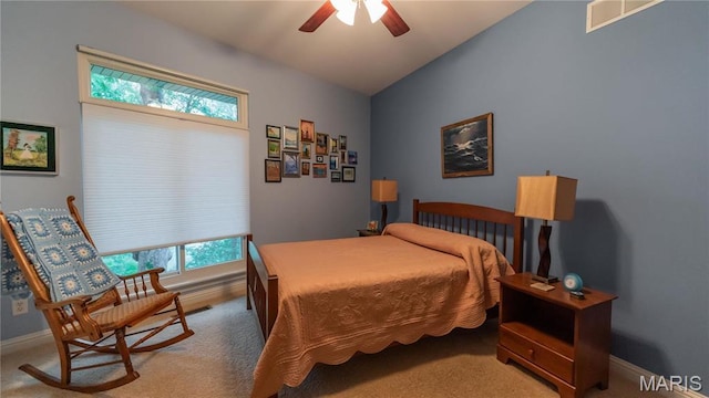 carpeted bedroom with baseboards and ceiling fan