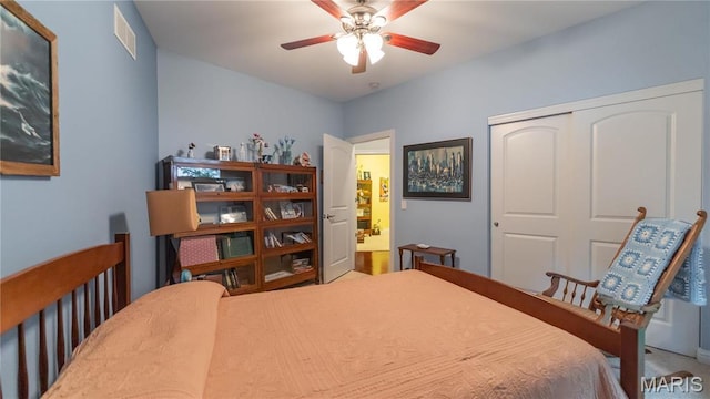 bedroom with a closet and ceiling fan