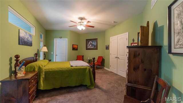 bedroom with carpet, ceiling fan, and baseboards