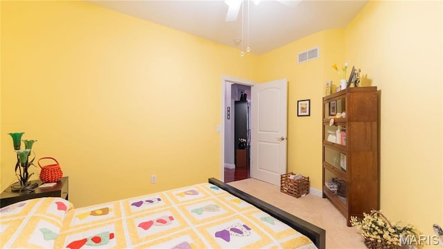 bedroom featuring carpet flooring, a ceiling fan, and baseboards
