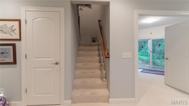 stairway with baseboards
