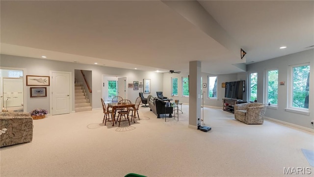 dining space featuring stairway, carpet flooring, recessed lighting, baseboards, and ceiling fan