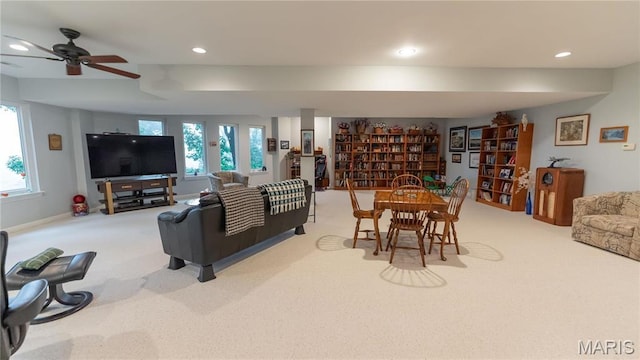 living area featuring carpet flooring, plenty of natural light, recessed lighting, and ceiling fan