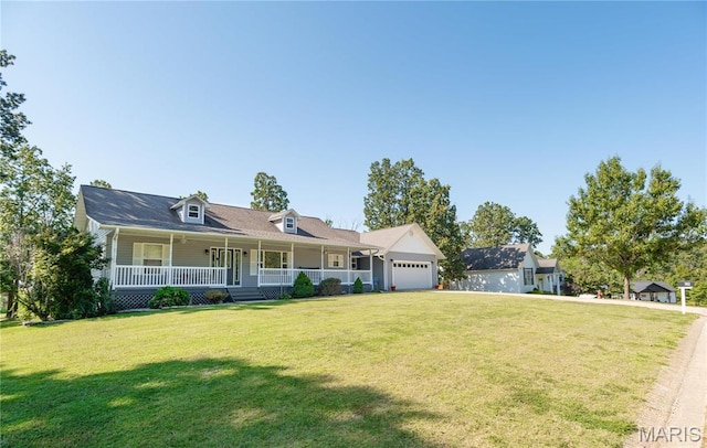 382 Christina Ln, Poplar Bluff, MO 63901 - view of front of home featuring covered porch, an attached garage, and a front lawn