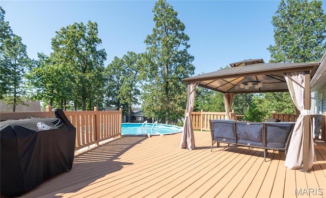 382 Christina Ln, Poplar Bluff, MO 63901 - wooden terrace featuring a gazebo, a grill, and an outdoor living space