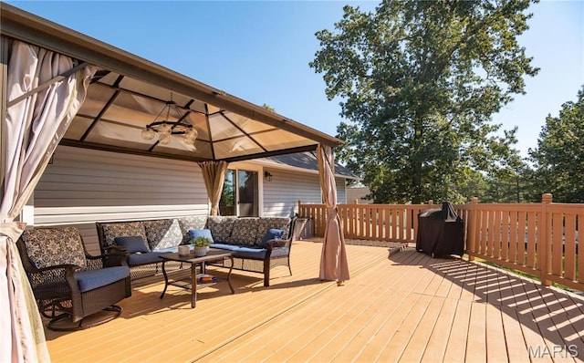 382 Christina Ln, Poplar Bluff, MO 63901 - wooden deck featuring a gazebo, outdoor lounge area, grilling area, and ceiling fan