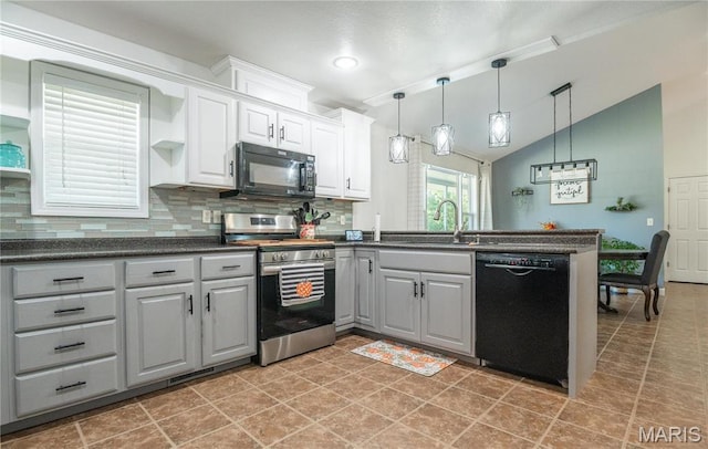 382 Christina Ln, Poplar Bluff, MO 63901 - kitchen featuring black appliances, dark countertops, a peninsula, tasteful backsplash, and lofted ceiling