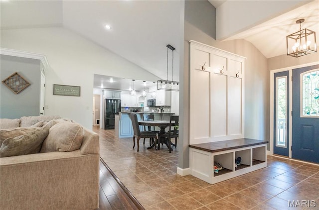 382 Christina Ln, Poplar Bluff, MO 63901 - mudroom featuring a chandelier, high vaulted ceiling, and tile patterned flooring