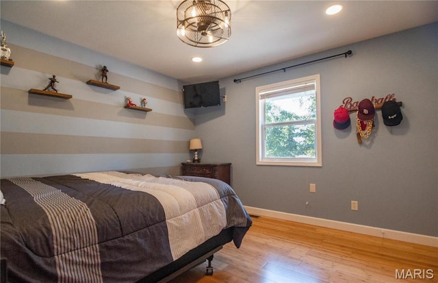 382 Christina Ln, Poplar Bluff, MO 63901 - bedroom with wood finished floors and recessed lighting