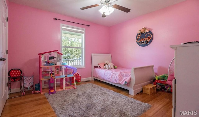 382 Christina Ln, Poplar Bluff, MO 63901 - bedroom featuring wood finished floors and ceiling fan