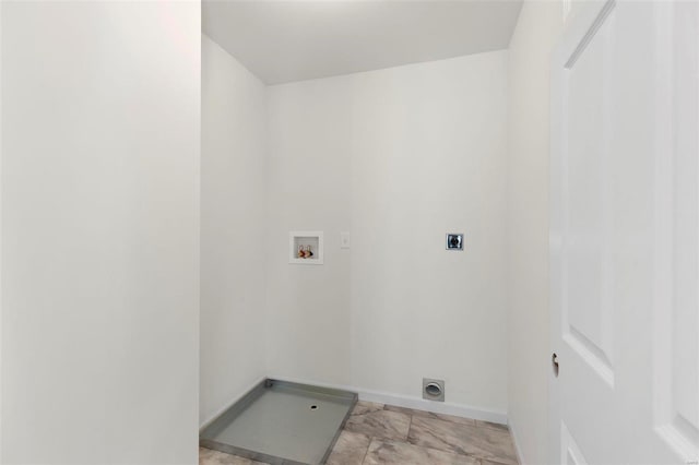 laundry area with electric dryer hookup, hookup for a washing machine, light marble finish floors, and baseboards
