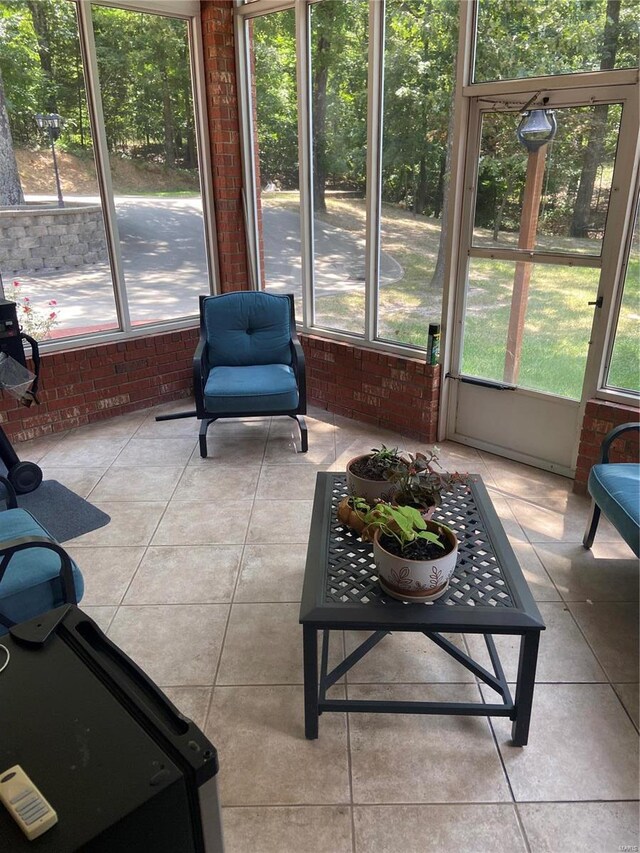 sunroom featuring plenty of natural light