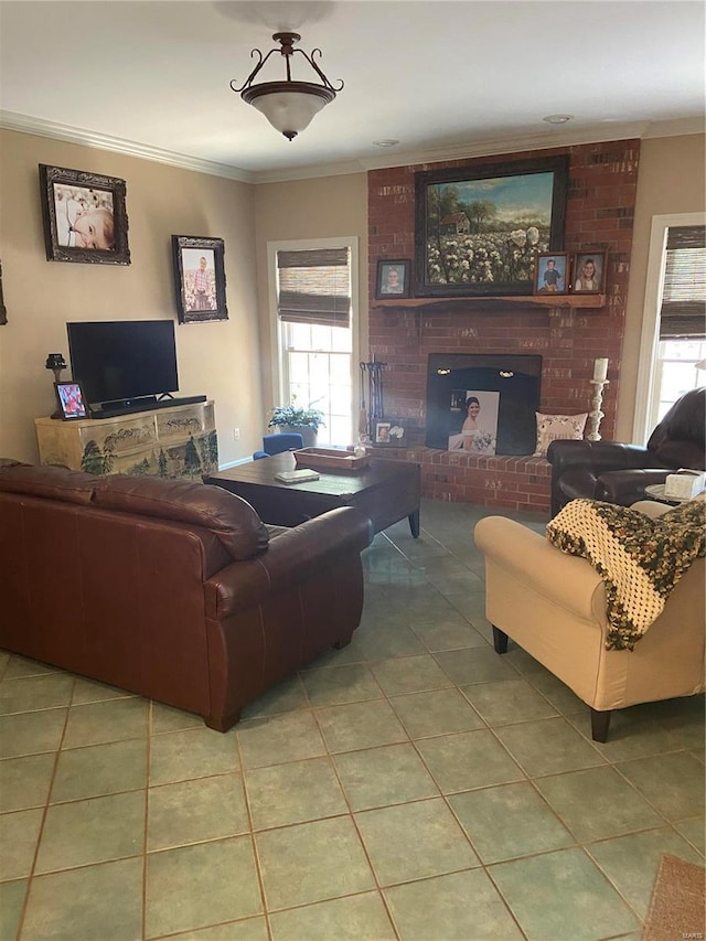 living area with tile patterned flooring, crown molding, and a fireplace