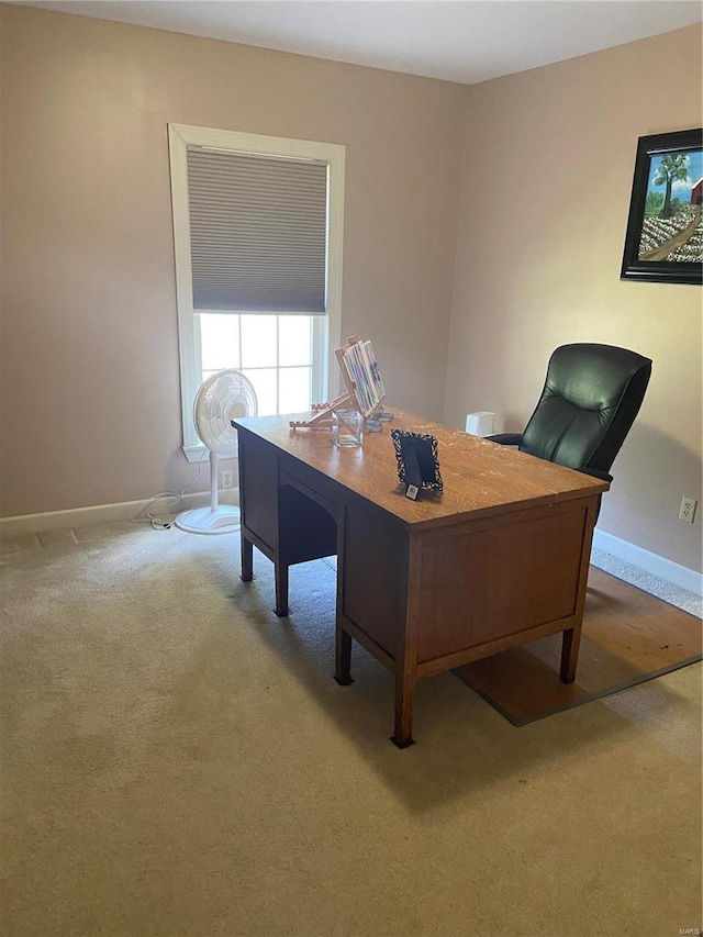 office area with carpet flooring and baseboards
