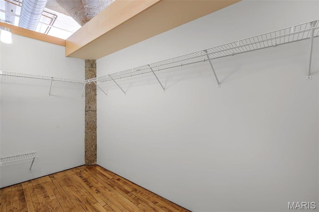 1010 Saint Charles St Unit 803, Saint Louis, MO 63101 - walk in closet with hardwood / wood-style floors