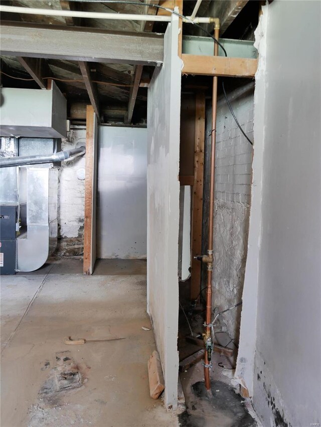 7210 Normandy Pl, Saint Louis, MO 63121 - unfinished basement featuring heating unit