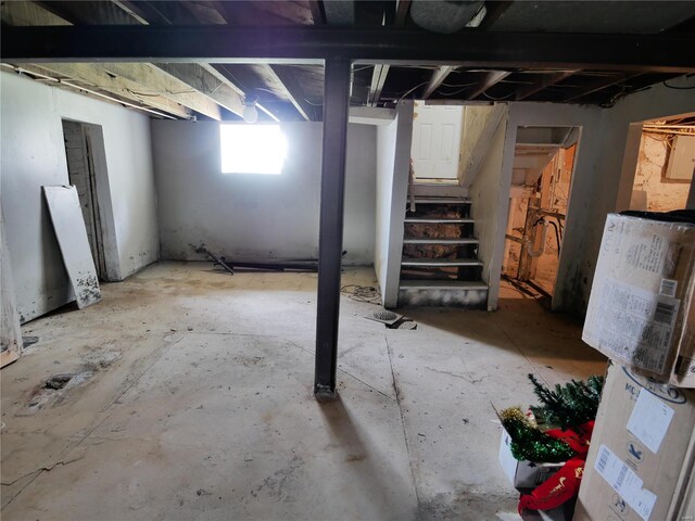7210 Normandy Pl, Saint Louis, MO 63121 - basement featuring stairway