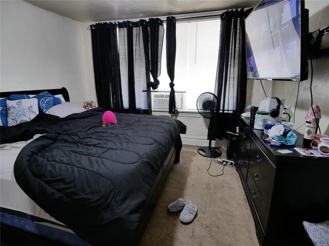 7210 Normandy Pl, Saint Louis, MO 63121 - bedroom featuring multiple windows, cooling unit, and light carpet