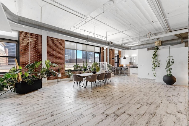 common area with brick wall