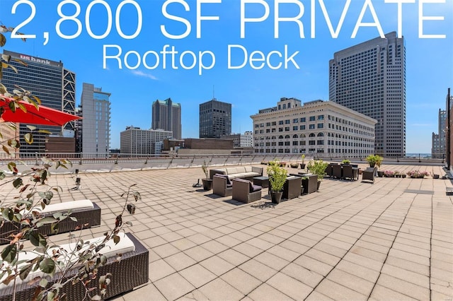 view of patio / terrace with outdoor lounge area and a view of skyline